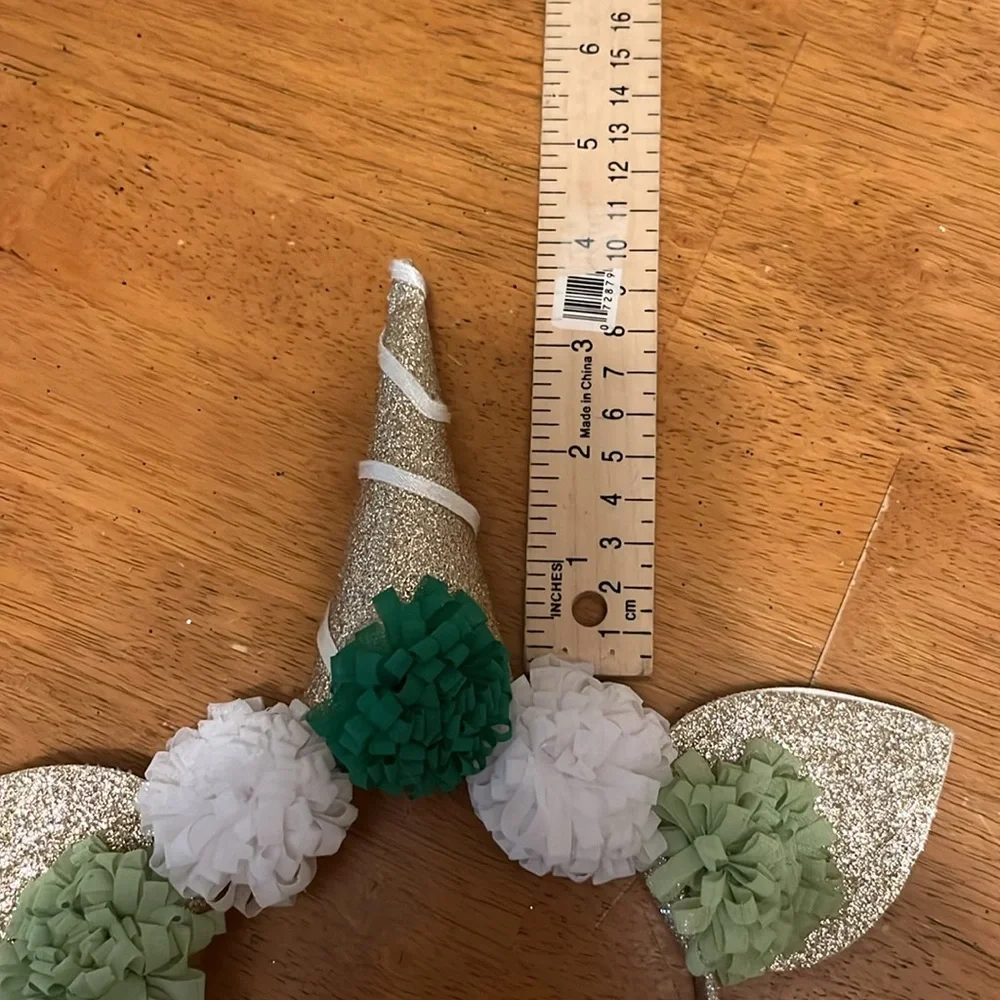 Gold Glitter Unicorn Headband With Green and White Pom Poms
